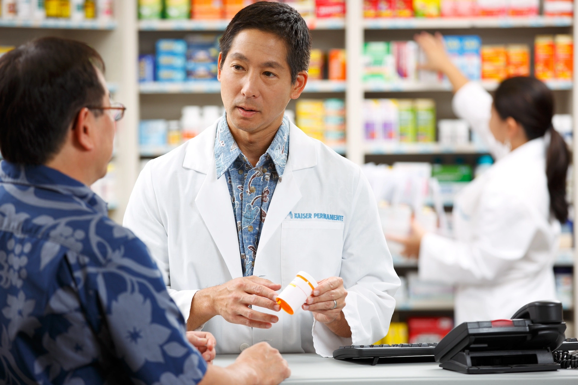 Doctor giving prescription to member